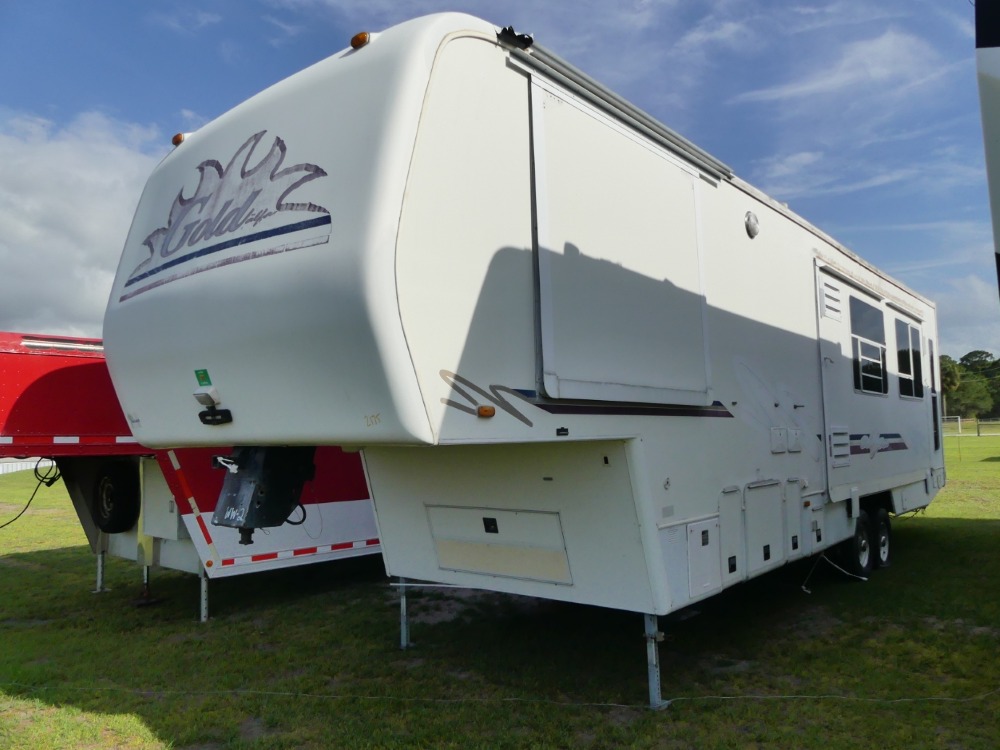 #2175 - 2000 Alfa Gold GF34RLT Fifth Wheel | DeMott Auction